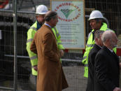 Charles chats with builders