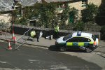 Police On Duty By The Road Bridge