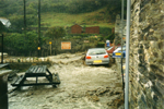Car Floats By The Spinning Wheel Cafe