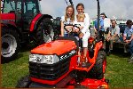 The Wickett Children On A Mini Tractor