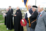 Father Storey, Reads The Names Of Those Who Died