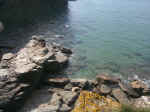 The Rocks With The Blue & Green Sea