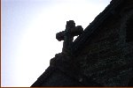 The Cross Silhouetted Against The Sky